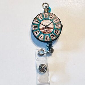 Retractable badge holder